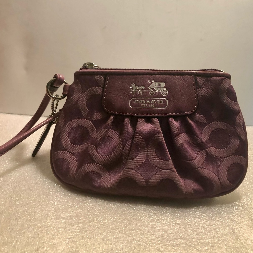 FREE W/purchase of $50 and up! 
Coach Wrislet Mini Wristlet